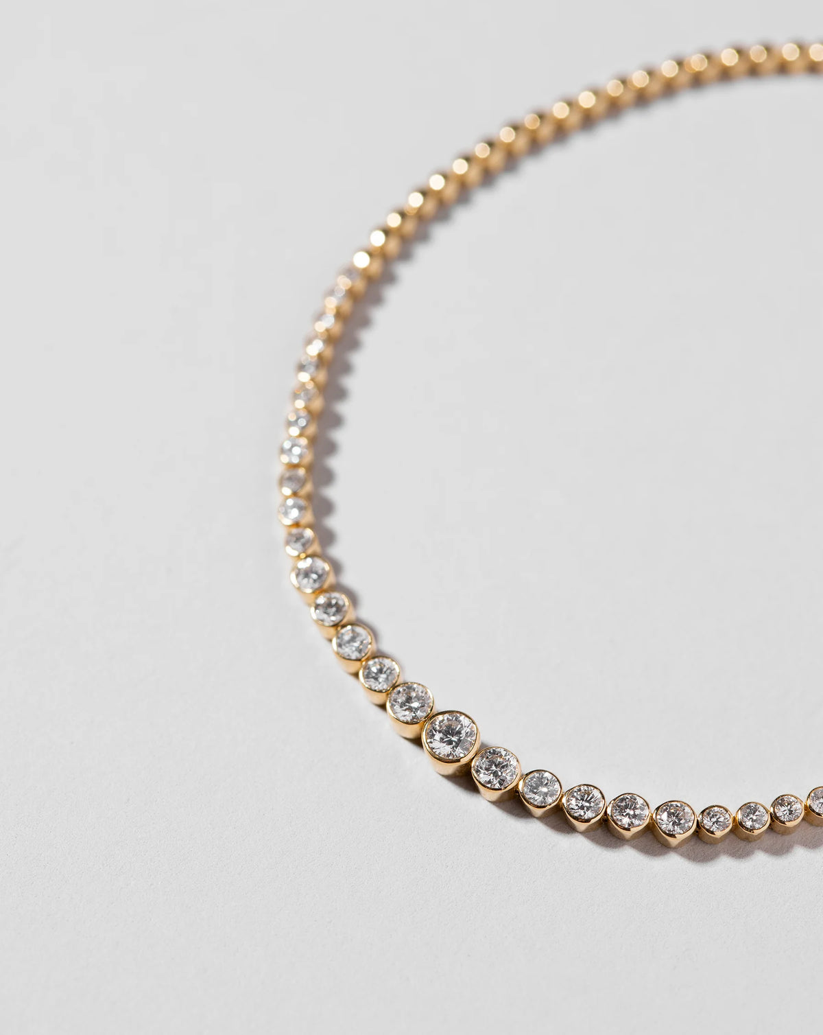 Graduated Bezel Diamond Tennis Bracelet